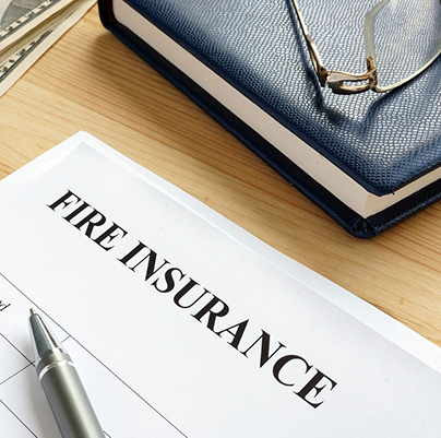 How is the Premium calculated under a Fire Insurance Policy?